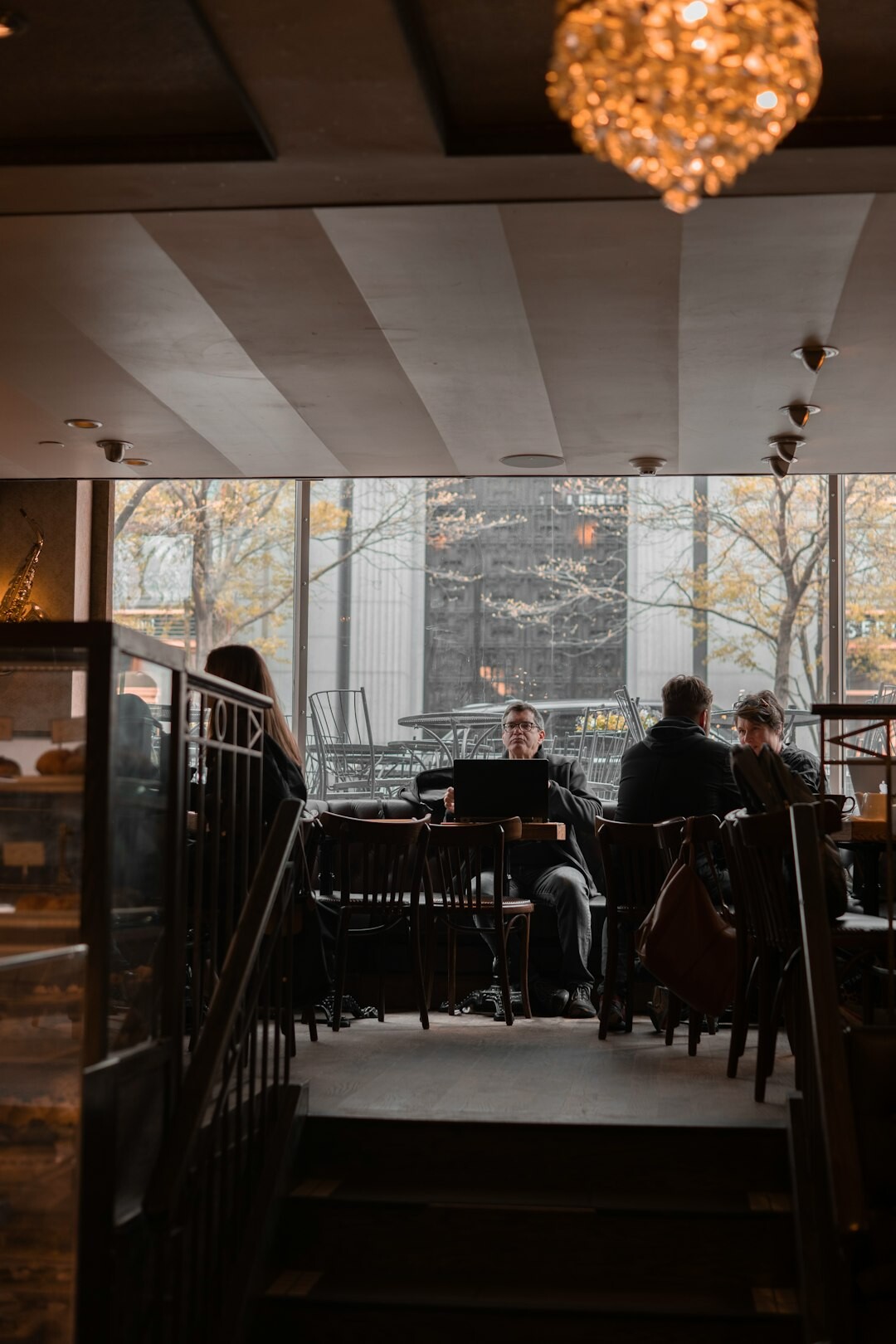 people in cafe observing