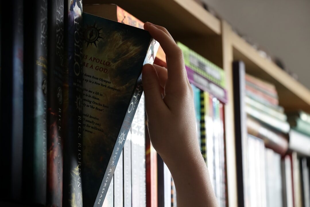 old books on wooden shelf